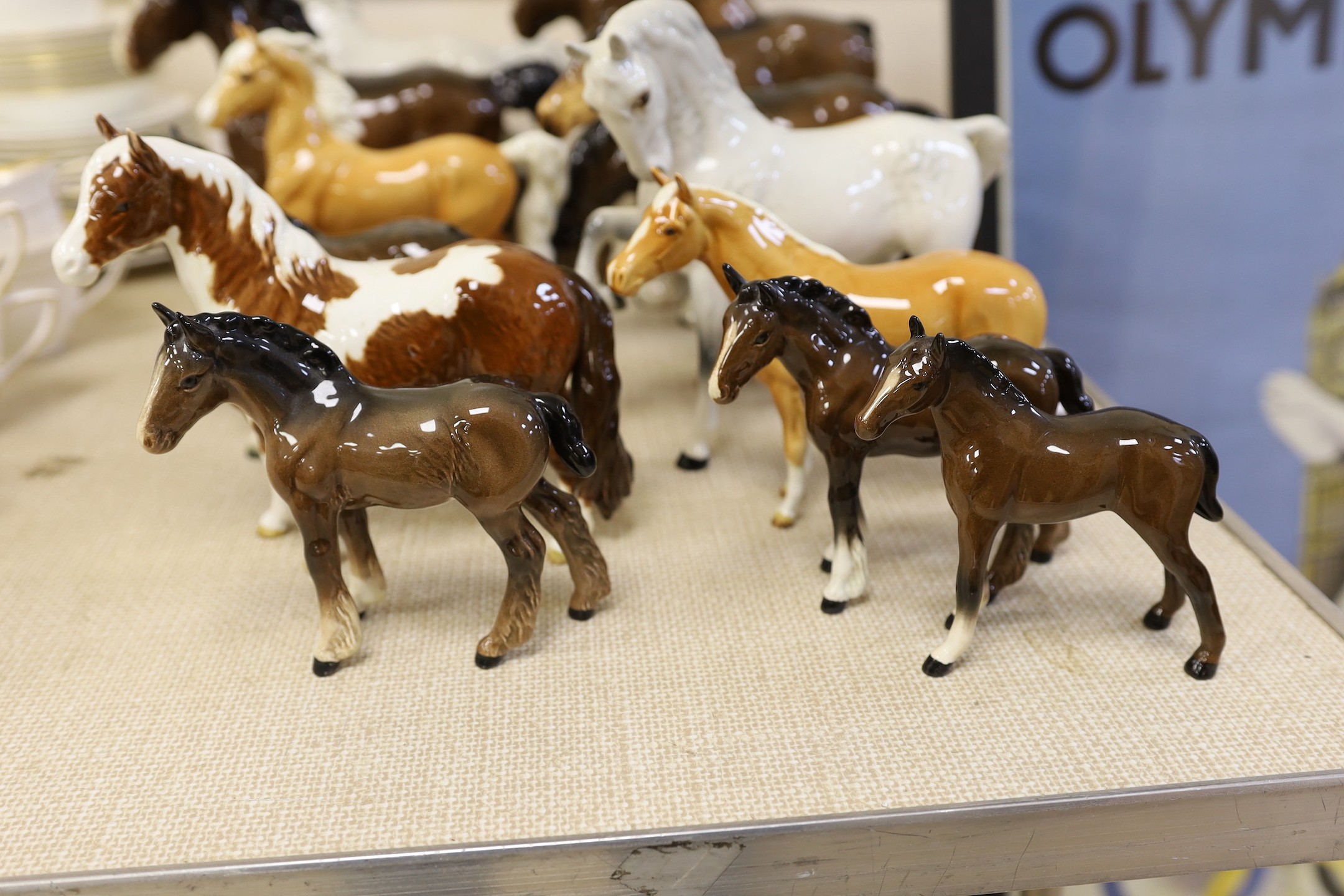 A selection of Beswick horses, to include Highland, Shire, Palomino and others (14)